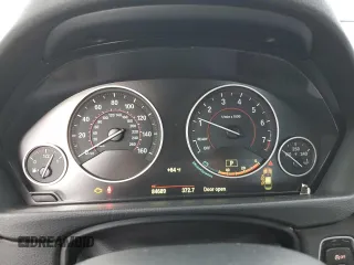 2015 BMW 3 Series 335i xDrive with VIN WBA3B9G55FNR93758, listed as a Copart auction lot 69772314 with 84,689 mi miles and Salvage Title. Bid and sale history available at carsss.com. Image 9.