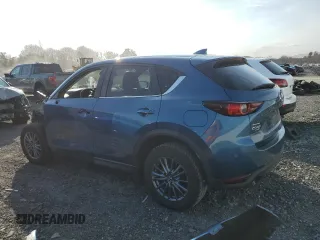 2017 Mazda CX-5 Touring with VIN JM3KFBCL4H0208376, listed as a Copart auction lot 48529895 with 71,689 mi miles and Salvage Title. Bid and sale history available at carsss.com. Image 2.