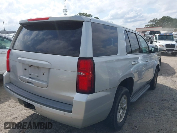 2017 Chevrolet Tahoe Commercial with VIN 1GNLCDECXHR238788, listed as a IAAI auction lot 41718161 with 129,880 mi miles and . Bid and sale history available at DreamBid. Image 4.