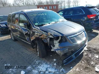2014 Chrysler Town & Country Touring L with VIN 2C4RC1CG4ER408446, listed as a IAAI auction lot 41624267 with 96,880 mi miles and . Bid and sale history available at carsss.com. Image 1.