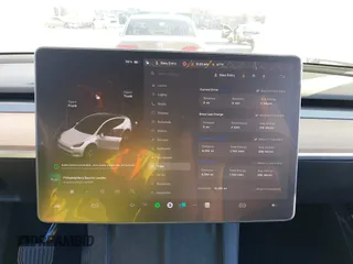 2023 Tesla Model Y Long Range z VIN 7SAYGDEE5PF765326, wystawiony jako IAAI lot #41757113 z przebiegiem 10 461 mil mil oraz . Historia ofert i sprzedaży dostępna na DreamBid. Obrazek 19.