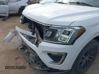 2019 Ford Expedition Max Limited with VIN 1FMJK2AT1KEA19158, listed as a IAAI auction lot 41894404 with 159,748 mi miles and . Bid and sale history available at DreamBid. Image 6.