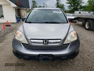 2007 Honda CR-V EX z VIN JHLRE48557C075398, wystawiony jako Copart lot #57833385 z przebiegiem 202 803 mil mil oraz Czysty tytuł • Clean title. Historia ofert i sprzedaży dostępna na DreamBid. Obrazek 5.