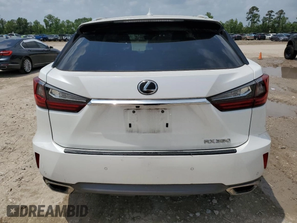 2016 Lexus RX 350 with VIN 2T2BZMCA1GC044207, listed as a Copart auction lot 54190245 with 156,285 mi miles and Salvage Title. Bid and sale history available at DreamBid. Image 6.