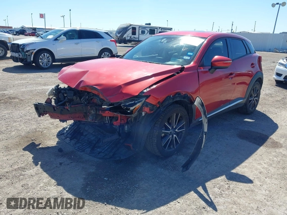 2016 Mazda CX-3 Grand Touring with VIN JM1DKBD71G0112329, listed as a IAAI auction lot 41662610 with 145,329 mi miles. Bid and sale history available at carsss.com. Image 17.