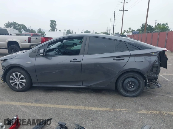 2021 Toyota Prius LE with VIN JTDKAMFP4M3194053, listed as a IAAI auction lot 42441091 with 47,290 mi miles and . Bid and sale history available at DreamBid. Image 15.