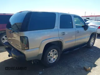 2005 Chevrolet Tahoe Z71 z VIN 1GNEC13TX5R195172, wystawiony jako IAAI lot #42080152 z przebiegiem 132 905 mil mil oraz . Historia ofert i sprzedaży dostępna na DreamBid. Obrazek 4.