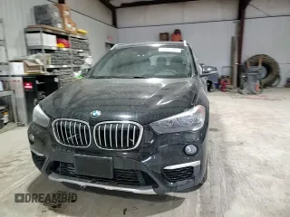 2018 BMW X1 xDrive28i with VIN WBXHT3C37J5L30341, listed as a Copart auction lot 42691505 with 84,523 mi miles and Salvage Title. Bid and sale history available at carsss.com. Image 11.