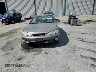 1998 Lexus ES 300 с VIN JT8BF28G6W5046785, выставлен на аукционе Copart как лот 55593105 с пробегом 228 132 миль миль и Списание • Salvage title. История ставок и продаж доступна на DreamBid. Изображение 13.