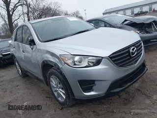 2016 Mazda CX-5 Sport with VIN JM3KE2BY5G0647715, listed as a IAAI auction lot 41831228 with 89,689 mi miles and . Bid and sale history available at carsss.com. Image 1.