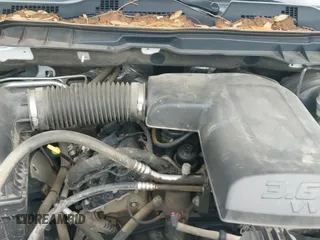 2019 Ram 1500 Tradesman z VIN 3C6RR7KG7KG657870, wystawiony jako IAAI lot #43054147 z przebiegiem 125 341 mil mil oraz . Historia ofert i sprzedaży dostępna na DreamBid. Obrazek 19.