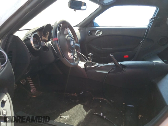 2014 Nissan 370Z with VIN JN1AZ4EH2EM631397, listed as a Copart auction lot 65758844 with 0 mi miles and Salvage Title. Bid and sale history available at carsss.com. Image 7.
