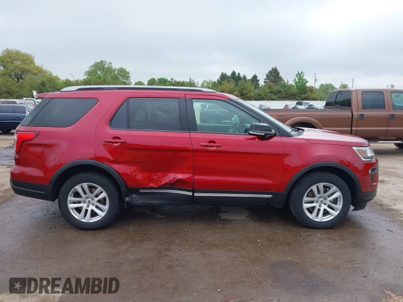 2018 Ford Explorer XLT z VIN 1FM5K8DH8JGA13677, wystawiony jako IAAI lot #42259550 z przebiegiem 71 257 mil mil oraz . Historia ofert i sprzedaży dostępna na DreamBid. Obrazek 13.