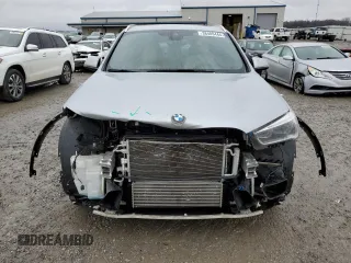 2017 BMW X1 sDrive28i with VIN WBXHU7C33H5H34013, listed as a Copart auction lot 38409444 with 87,558 mi miles and Salvage Title. Bid and sale history available at carsss.com. Image 5.