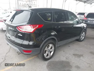 2015 Ford Escape SE with VIN 1FMCU0GXXFUC80317, listed as a IAAI auction lot 42047476 with 230,381 mi miles and . Bid and sale history available at DreamBid. Image 4.
