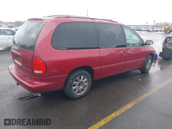 1999 Chrysler Town & Country with VIN 1C4GT64L7XB723937, listed as a IAAI auction lot 41609957 with 242,800 mi miles and . Bid and sale history available at DreamBid. Image 4.