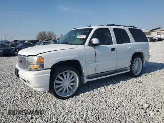 2004 GMC Yukon Denali z VIN 1GKEK63U24J328168, wystawiony jako Copart lot #53293615 z przebiegiem 145 692 mil mil oraz Szkoda całkowita • Salvage title. Historia ofert i sprzedaży dostępna na DreamBid. Obrazek 1.