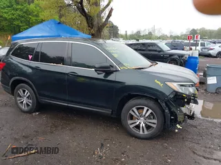 2016 Honda Pilot EX-L z VIN 5FNYF6H56GB127609, wystawiony jako IAAI lot #42186505 z przebiegiem 95 945 mil mil oraz . Historia ofert i sprzedaży dostępna na DreamBid. Obrazek 13.