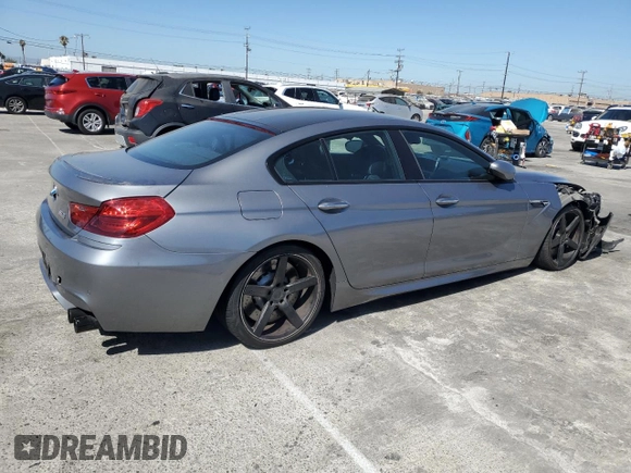 2015 BMW M6 z VIN WBS6C9C56FD467608, wystawiony jako Copart lot #67796074 z przebiegiem 67 706 mil mil oraz Szkoda całkowita • Salvage title. Historia ofert i sprzedaży dostępna na DreamBid. Obrazek 3.
