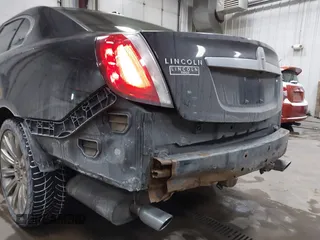 2010 Lincoln MKS w/EcoBoost with VIN 1LNHL9FT5AG606768, listed as a IAAI auction lot 41504590 with 112,275 mi miles. Bid and sale history available at carsss.com. Image 6.