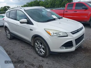 2015 Ford Escape Titanium with VIN 1FMCU0J99FUB92563, listed as a IAAI auction lot 42649556 with 183,199 mi miles and . Bid and sale history available at DreamBid. Image 1.