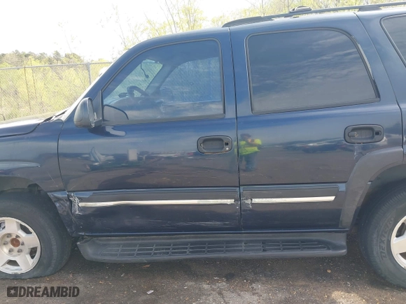 2004 Chevrolet Tahoe LT with VIN 1GNEC13Z84R209220, listed as a IAAI auction lot 41867643 with 385,229 mi miles. Bid and sale history available at carsss.com. Image 13.