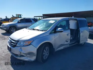2014 Honda Odyssey EX-L with VIN 5FNRL5H63EB041106, listed as a IAAI auction lot 42294113 with 122,610 mi miles and . Bid and sale history available at DreamBid. Image 6.