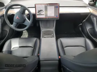 2022 Tesla Model 3 Long Range with VIN 5YJ3E1EB4NF139023, listed as a Copart auction lot 51410345 with 54,789 mi miles and Salvage Title. Bid and sale history available at DreamBid. Image 8.
