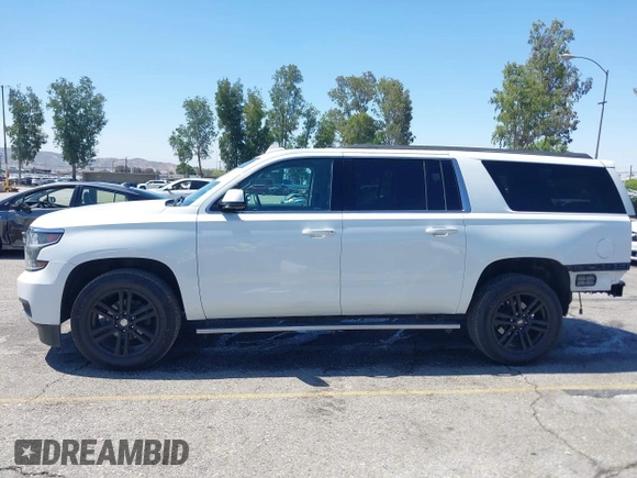 2017 Chevrolet Suburban LT z VIN 1GNSKHKC7HR325641, wystawiony jako IAAI lot #42290768 z przebiegiem 91 802 mil mil oraz . Historia ofert i sprzedaży dostępna na DreamBid. Obrazek 15.
