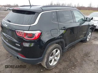 2018 Jeep Compass Altitude with VIN 3C4NJDBB2JT108035, listed as a IAAI auction lot 42013400 with 179,886 mi miles and . Bid and sale history available at carsss.com. Image 4.