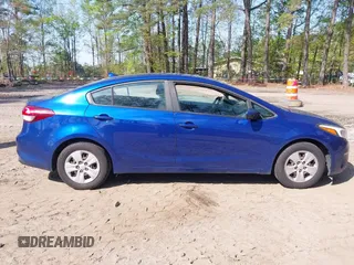 2017 Kia Forte LX with VIN 3KPFK4A70HE052223, listed as a IAAI auction lot 42036382 with 136,671 mi miles. Bid and sale history available at carsss.com. Image 13.