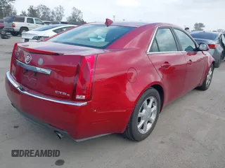 2009 Cadillac CTS AWD w/1SA with VIN 1G6DG577990113572, listed as a IAAI auction lot 42110784 with 229,692 mi miles. Bid and sale history available at carsss.com. Image 4.