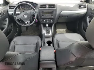 2014 Volkswagen Jetta SE with VIN 3VWD17AJ2EM391314, listed as a Copart auction lot 57357575 with 131,968 mi miles and Salvage title. Bid and sale history available at DreamBid. Image 8.