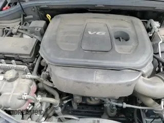 2018 Jeep Grand Cherokee Laredo E z VIN 1C4RJFAG9JC295201, wystawiony jako Copart lot #69395835 z przebiegiem 63 996 mil mil oraz Czysty tytuł • Clean title. Historia ofert i sprzedaży dostępna na DreamBid. Obrazek 14.