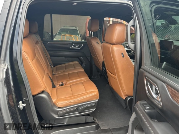 2021 Chevrolet Suburban LS with VIN 1GNSCBKD9MR480205, listed as a Copart auction lot 59422385 with 142,332 mi miles and Salvage title. Bid and sale history available at DreamBid. Image 6.