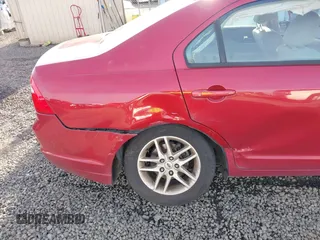 2010 Ford Fusion S with VIN 3FAHP0GA7AR228386, listed as a IAAI auction lot 41613583 with 99,281 mi miles. Bid and sale history available at carsss.com. Image 6.