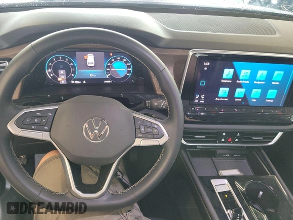 2024 Volkswagen Atlas SE with VIN 1V2HR2CA7RC555188, listed as a IAAI auction lot 42791847 with 29,357 mi miles and . Bid and sale history available at DreamBid. Image 22.