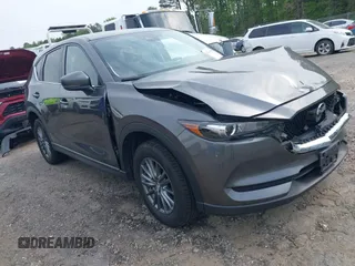 2017 Mazda CX-5 Touring z VIN JM3KFBCL4H0178747, wystawiony jako IAAI lot #42041380 z przebiegiem 112 083 mil mil oraz . Historia ofert i sprzedaży dostępna na DreamBid. Obrazek 1.
