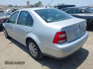 2004 Volkswagen Jetta GL z VIN 3VWRA69M34M031594, wystawiony jako IAAI lot #42565161 z przebiegiem 191 011 mil mil oraz . Historia ofert i sprzedaży dostępna na DreamBid. Obrazek 3.