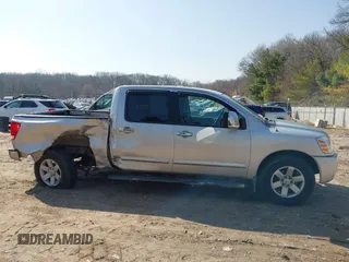 2004 Nissan Titan LE z VIN 1N6AA07B44N573319, wystawiony jako IAAI lot #42004100 z przebiegiem 196 357 mil mil oraz . Historia ofert i sprzedaży dostępna na DreamBid. Obrazek 13.