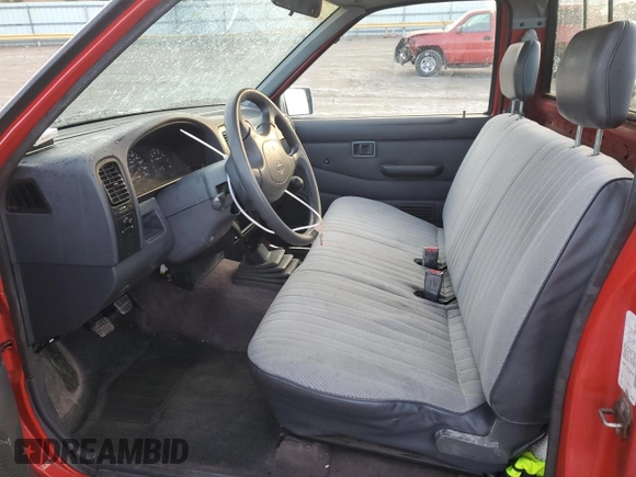 1994 Nissan Frontier with VIN 1N6SD11SXRC360680, listed as a Copart auction lot 84196824 with 105,338 mi miles and Salvage title. Bid and sale history available at DreamBid. Image 7.