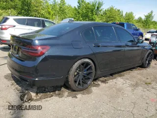 2016 BMW 7 Series 740i with VIN WBA7E2C56GG738788, listed as a Copart auction lot 60654015 with 96,059 mi miles and Clean title. Bid and sale history available at DreamBid. Image 3.