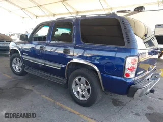 2003 Chevrolet Tahoe LT with VIN 1GNEC13T03J180708, listed as a IAAI auction lot 41543671 with 203,442 mi miles. Bid and sale history available at carsss.com. Image 3.