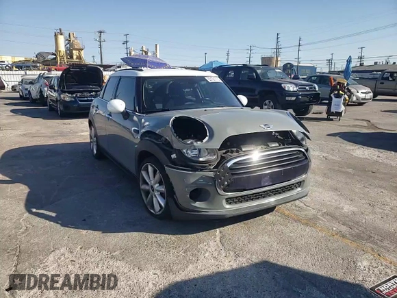 2016 MINI Hardtop 4 Door with VIN WMWXU1C59G2D11117, listed as a Copart auction lot 65191715 with 121,633 mi miles and Salvage title. Bid and sale history available at DreamBid. Image 13.