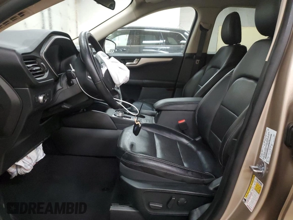 2020 Ford Escape SEL z VIN 1FMCU9H64LUC28297, wystawiony jako Copart lot #58693515 z przebiegiem 57 038 mil mil oraz Szkoda całkowita • Salvage title. Historia ofert i sprzedaży dostępna na DreamBid. Obrazek 7.