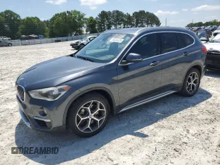 2017 BMW X1 sDrive28i with VIN WBXHU7C32HP925374, listed as a Copart auction lot 54820225 with 136,708 mi miles and Clean Title. Bid and sale history available at carsss.com. Image 1.