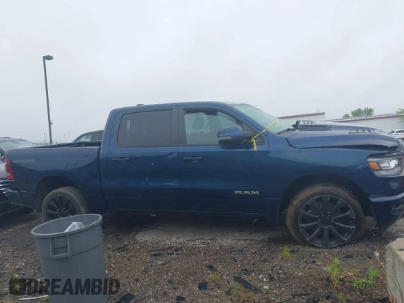 2023 Ram 1500 Laramie with VIN 1C6SRFJT9PN542437, listed as a IAAI auction lot 42256410 with 5 mi miles and . Bid and sale history available at DreamBid. Image 13.