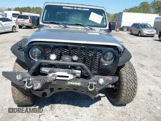 2021 Jeep Gladiator Freedom with VIN 1C6HJTAG3ML540967, listed as a IAAI auction lot 41883858 with 92,287 mi miles and . Bid and sale history available at DreamBid. Image 12.