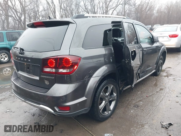 2017 Dodge Journey Crossroad Plus z VIN 3C4PDCGB5HT501363, wystawiony jako IAAI lot #41178334 z przebiegiem 119 076 mil mil oraz . Historia ofert i sprzedaży dostępna na DreamBid. Obrazek 4.