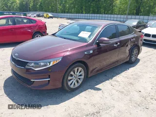 2018 Kia Optima LX with VIN 5XXGT4L39JG259153, listed as a IAAI auction lot 42076003 with 191,321 mi miles and . Bid and sale history available at DreamBid. Image 2.